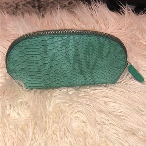 H20+ turquoise makeup case